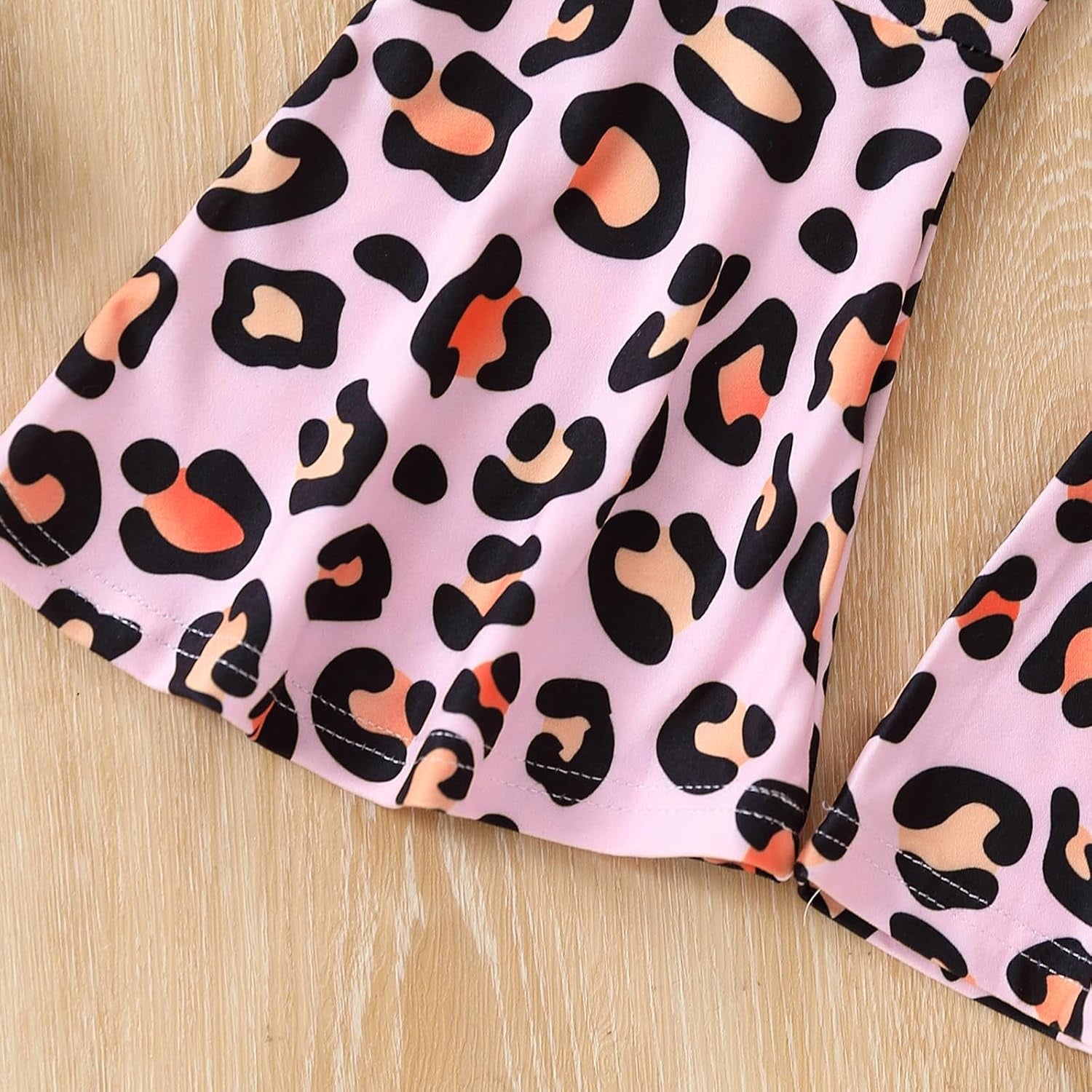 Chic Leopard Flare Set – Trendy Graphic Tee & Statement Pants for Toddlers 🖤🐆